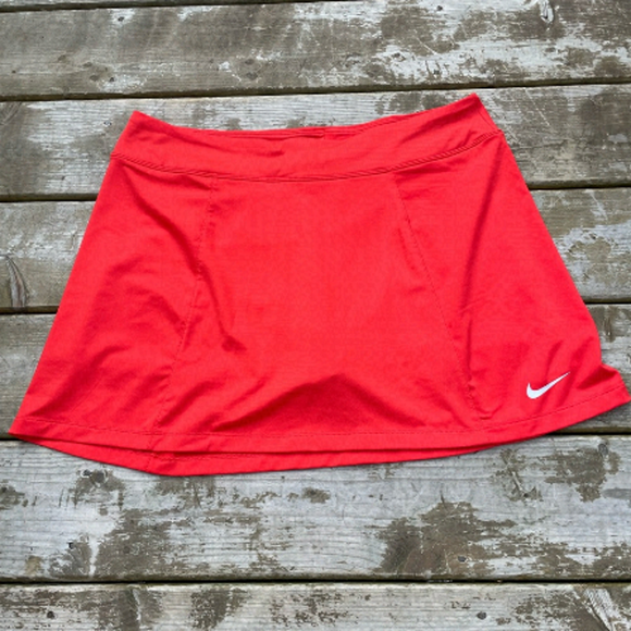 Nike Pants - NIKE red golf skirt size XL